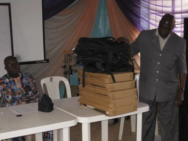 Rev Dr. Soja Bewarang dedicating 5 computers for reviewers during 2015 workshop